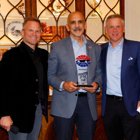 Dover President and General Manager Mike Tatoian (center) accepts Speedway Motorsports' Promoter of the Year award from Speedway Motorsports CEO Marcus Smith (left) and Mike Burch, the company's Executive Vice President and Chief Operating Officer. 